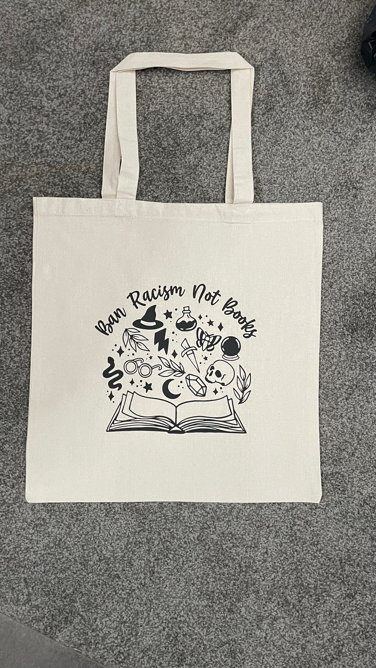 Ban Racism Not Books Tote Bag